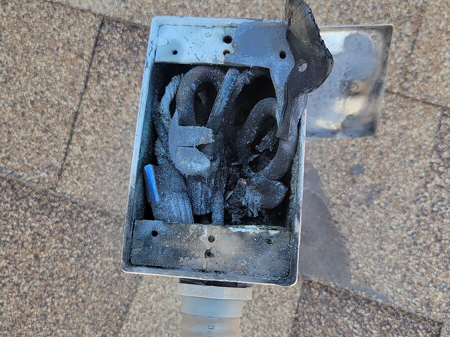 Burned electrical box and melted wire damage checked when AC smells like burning plastic
