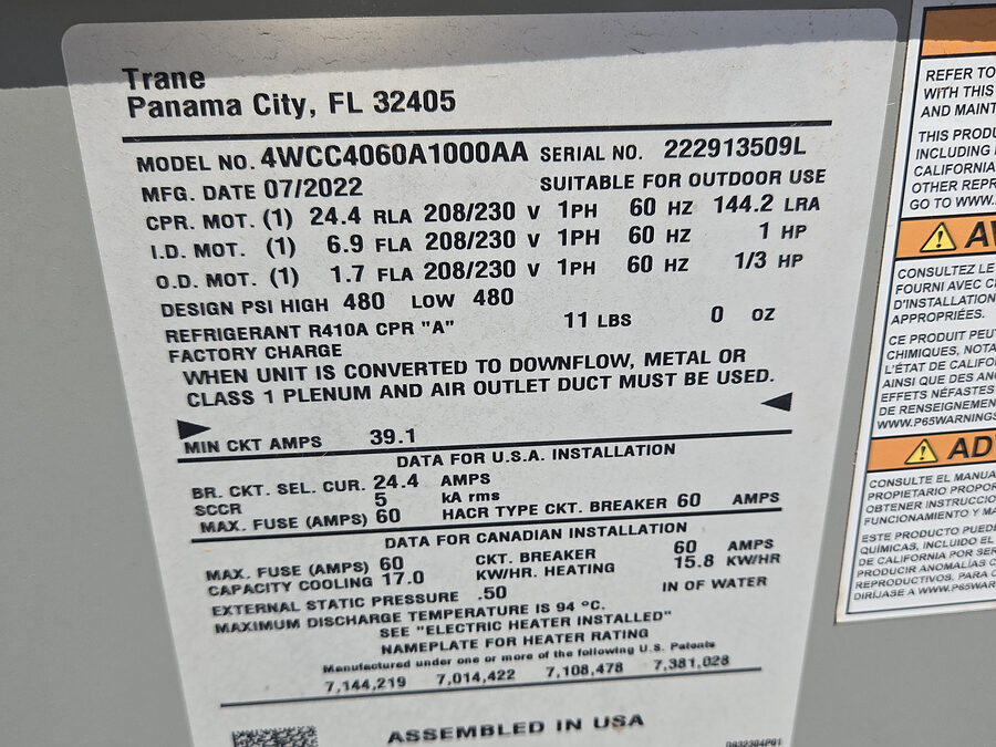 HVAC equipment data plate checked for AC replacement warranty registration