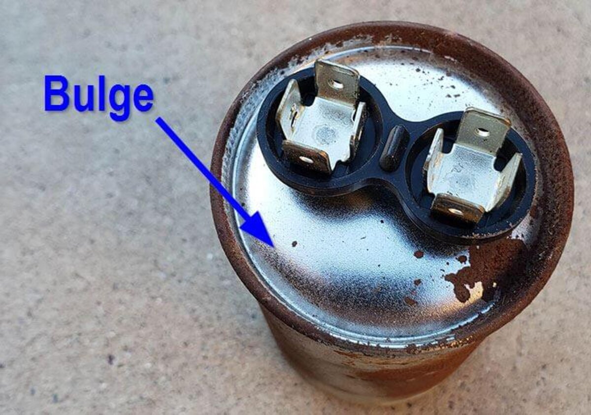 Bulging top on a failed HVAC capacitor