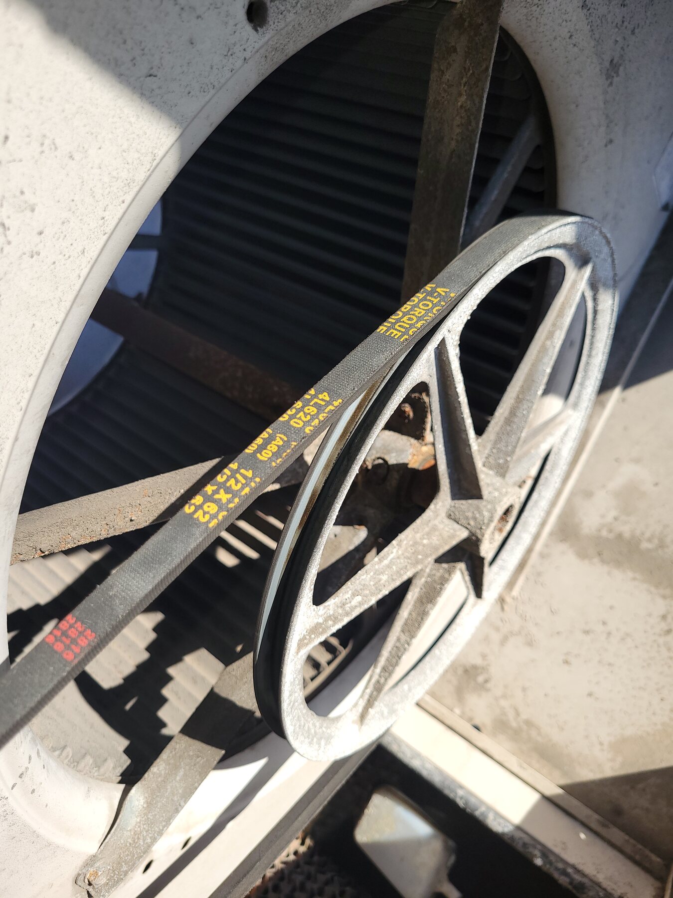HVAC belt and pulley detail inside mechanical equipment
