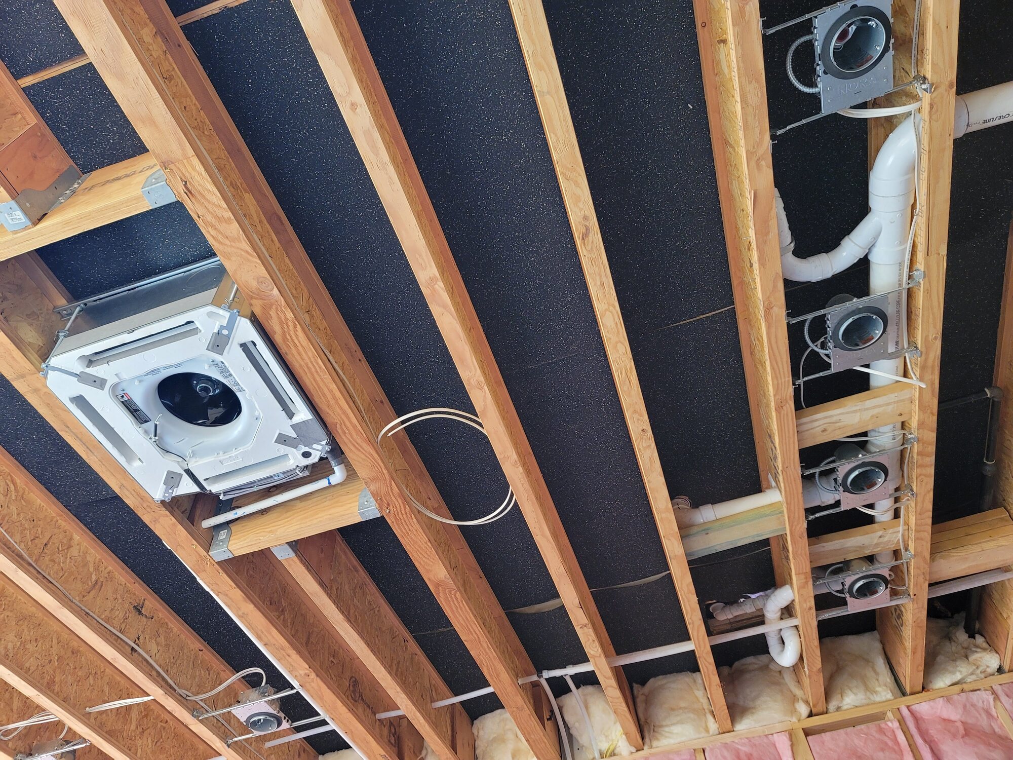 Ceiling framing and cassette HVAC installation work in progress