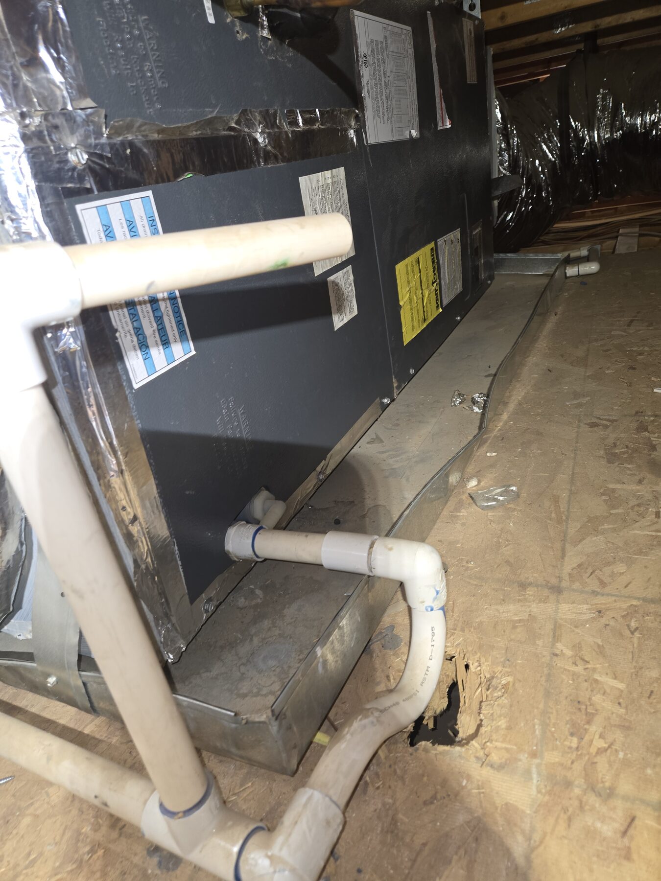 Air handler condensate drain line and PVC piping