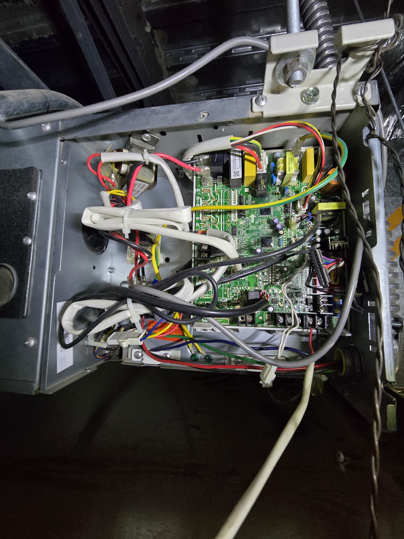 HVAC control board and low voltage wiring inside equipment
