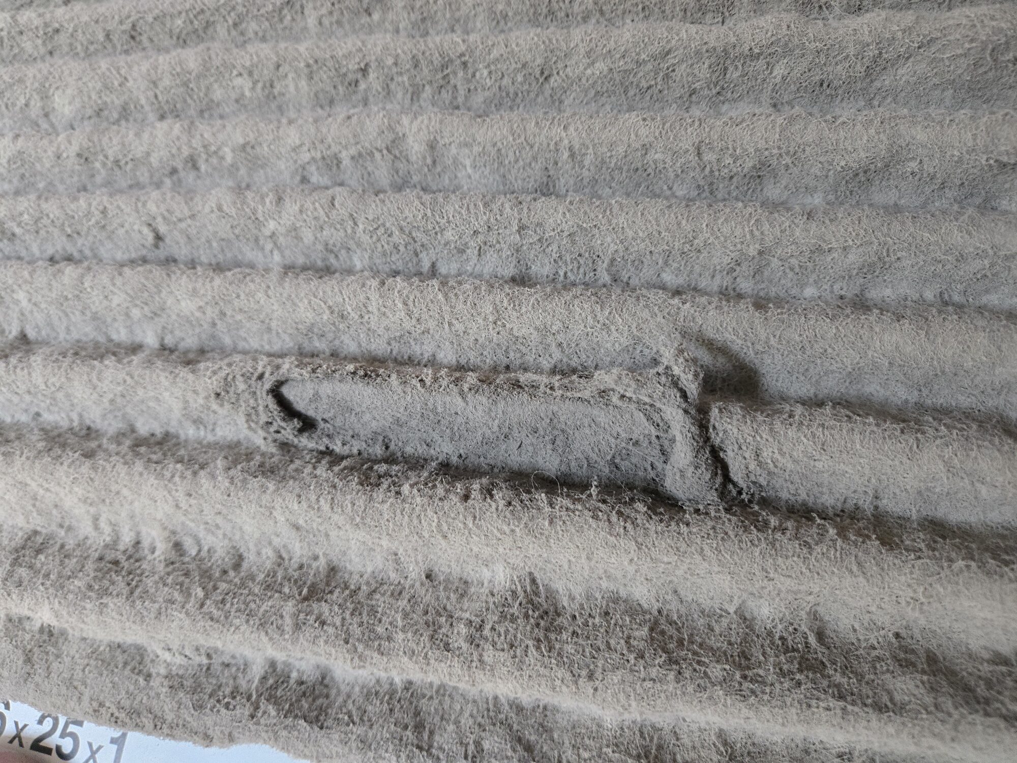 Dirty air filter removed during AC service