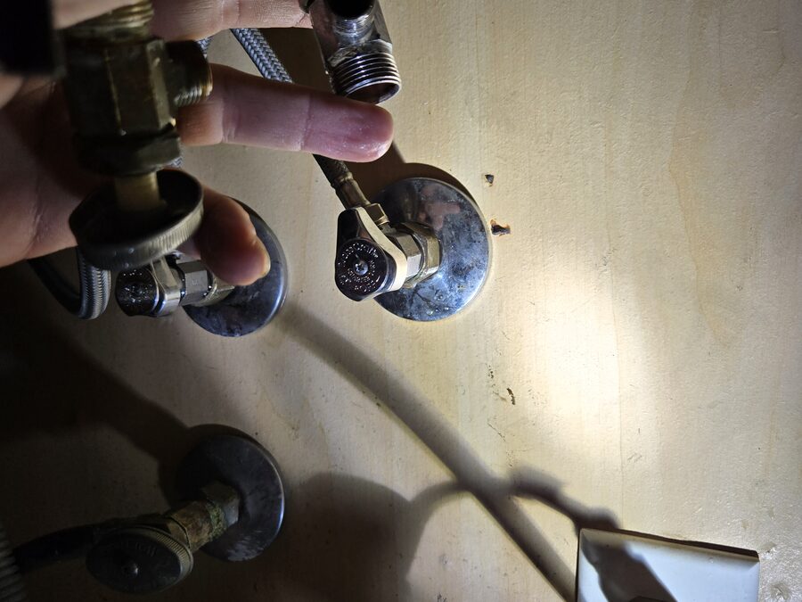 Under-sink shutoff valves and supply-line connections checked during fixture repair