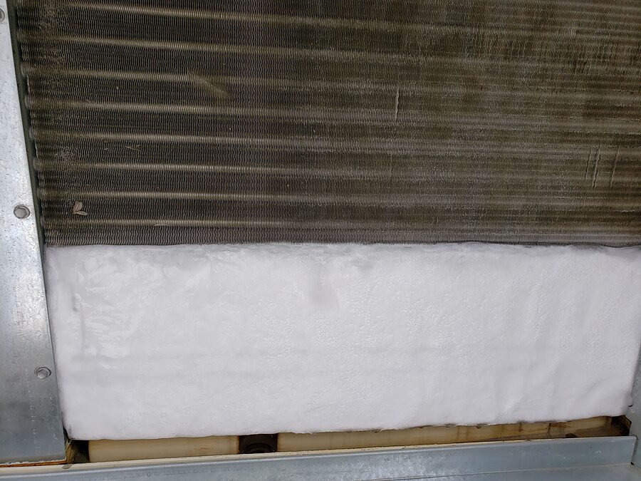 Frozen evaporator coil ice that can contribute to AC short cycling
