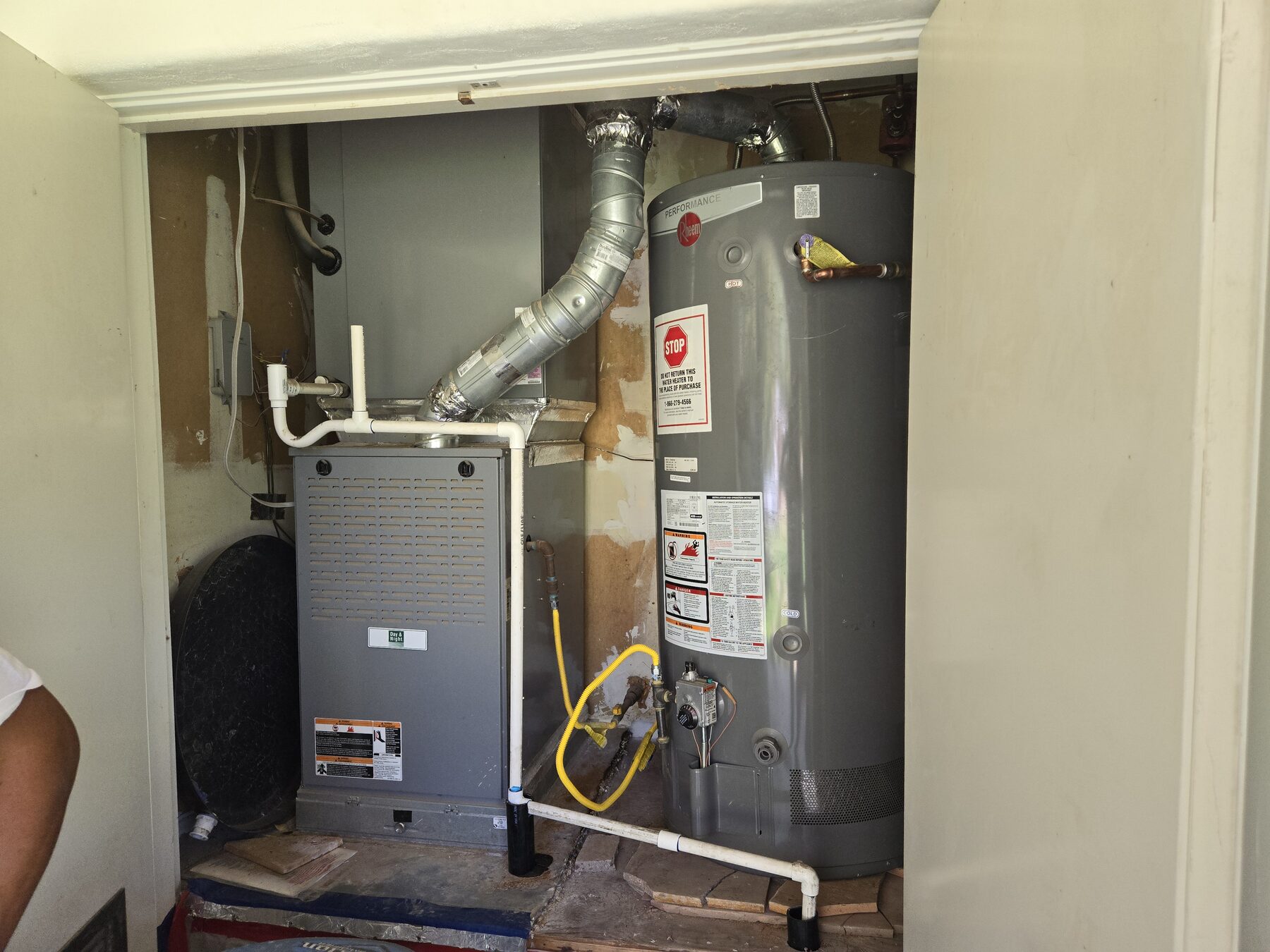 Furnace and water heater closet with shared equipment space