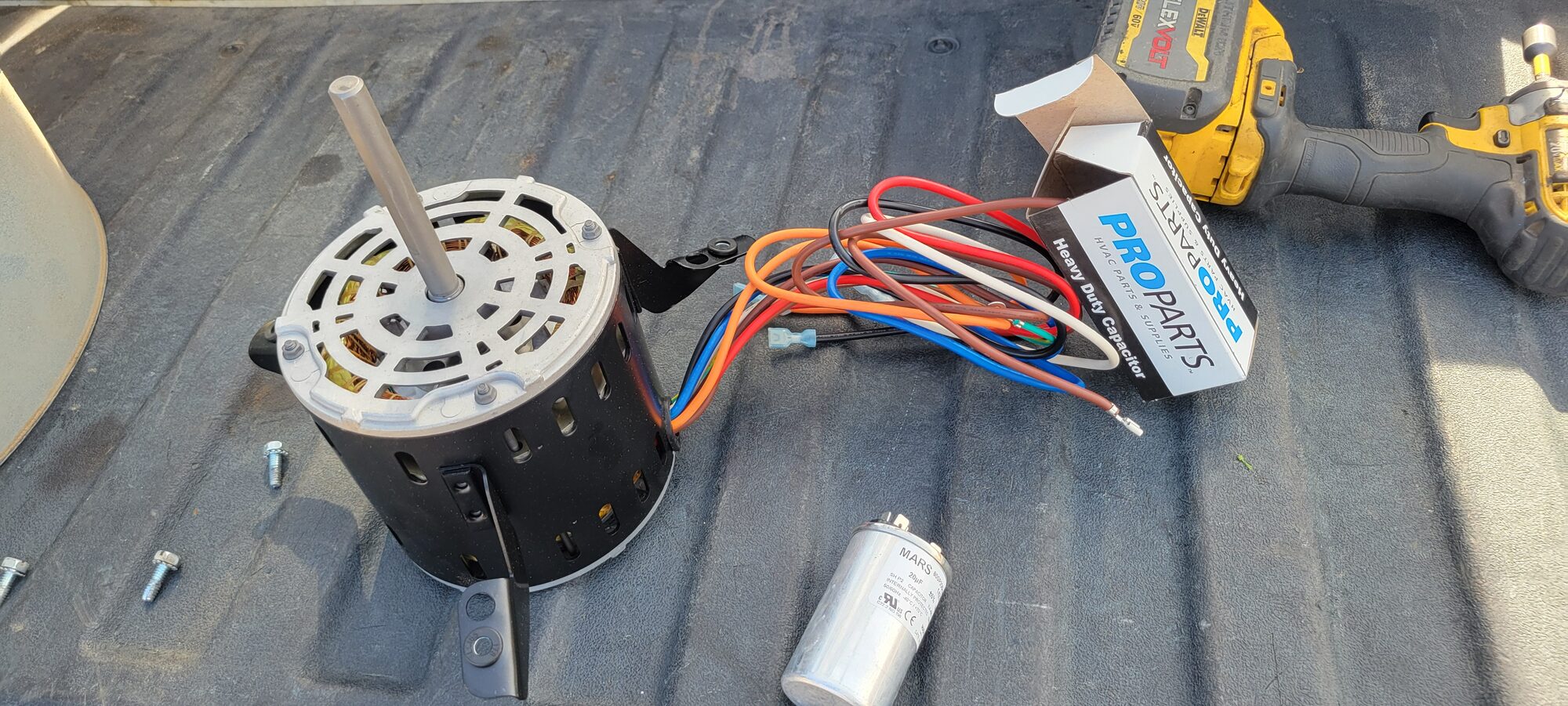 HVAC motor and capacitor parts during repair