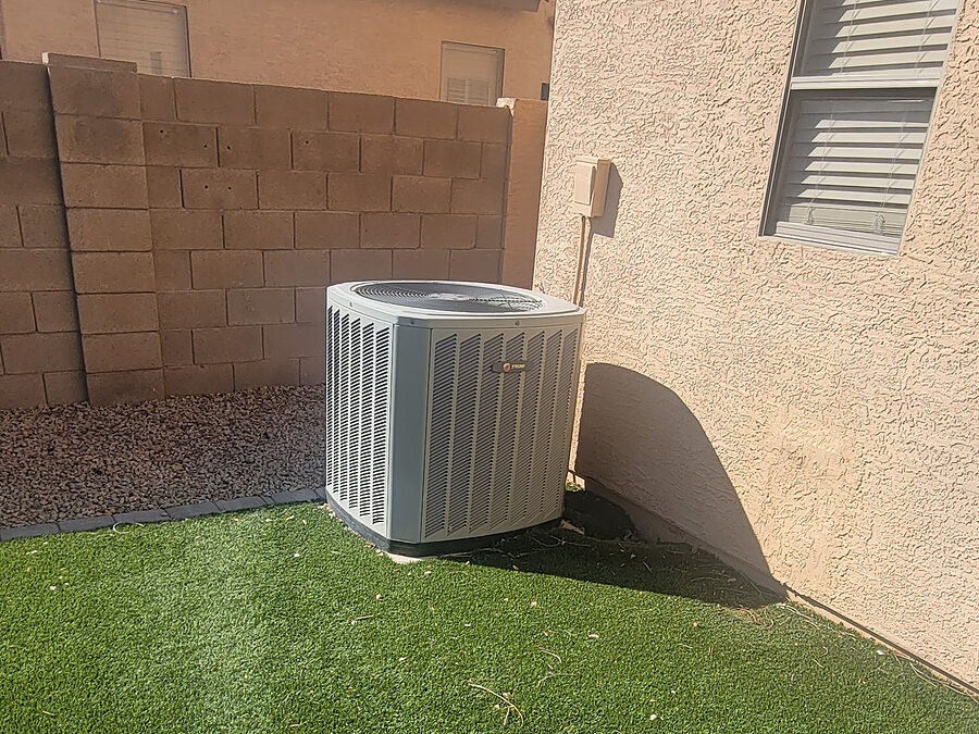Outdoor condenser checked during AC replacement planning and compressor repair decisions