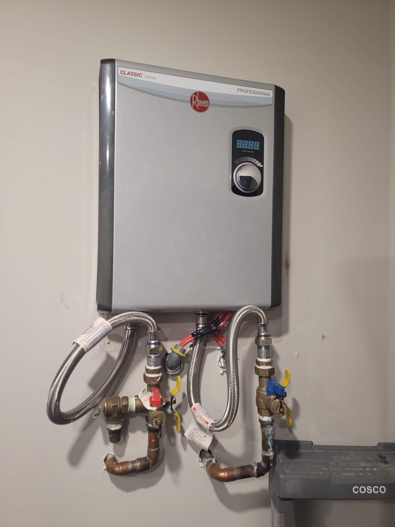 Tankless water heater and plumbing connections checked during plumbing service