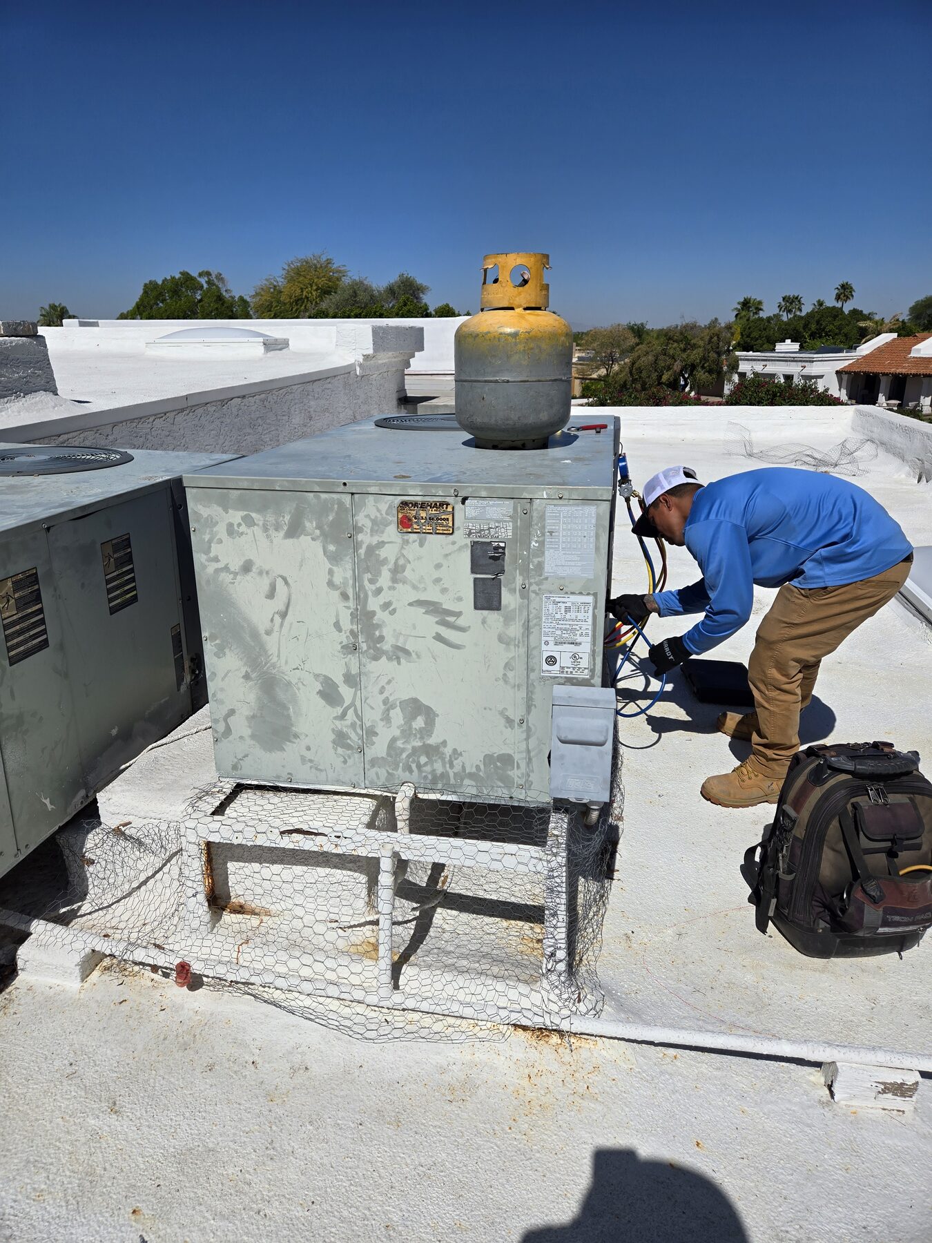 Open HVAC unit during AC diagnostics for Cave Creek service calls