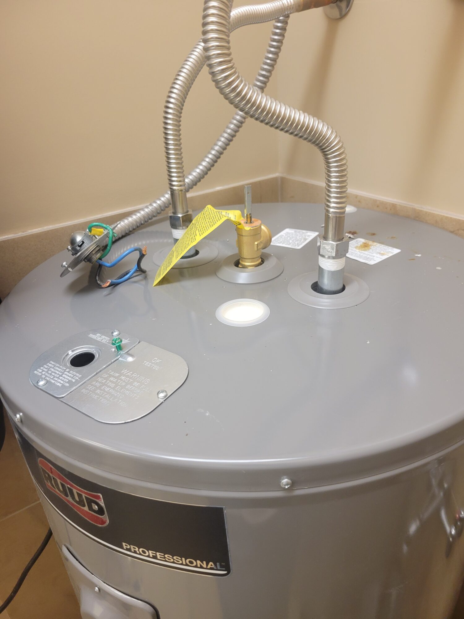 Water heater venting and connections checked during service