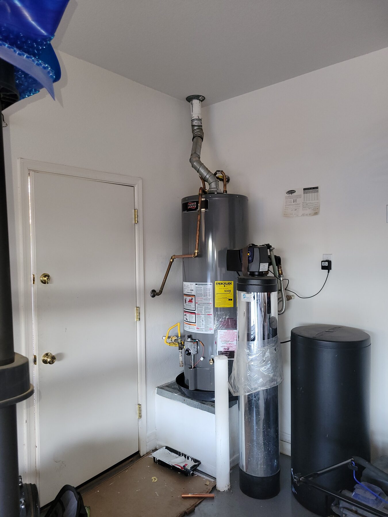 Water heater and expansion tank installed in a garage