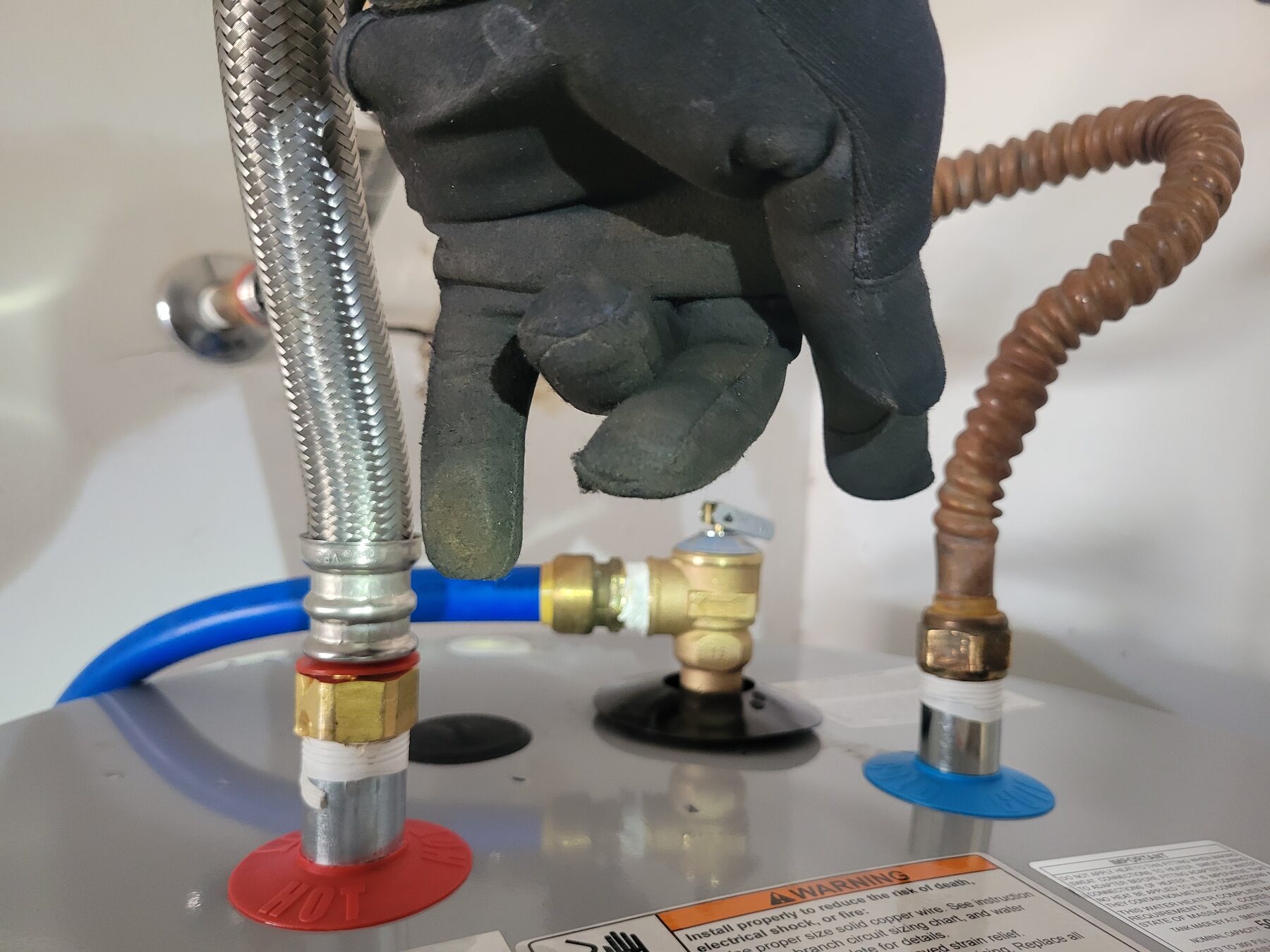 Water heater supply lines and plumbing connections